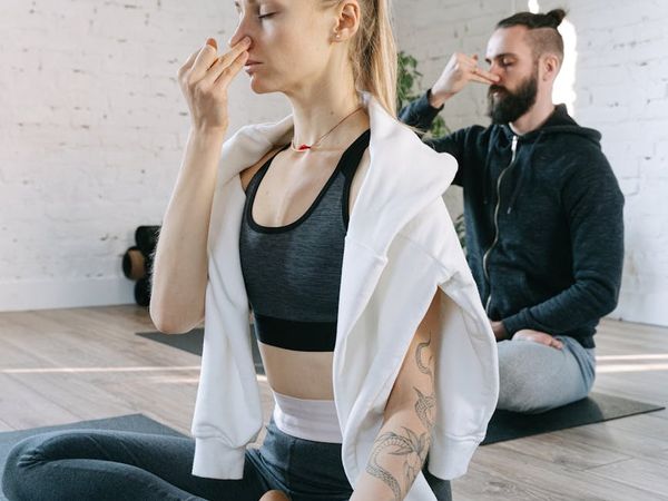 A serene space with yoga mats ready for a relaxation session.